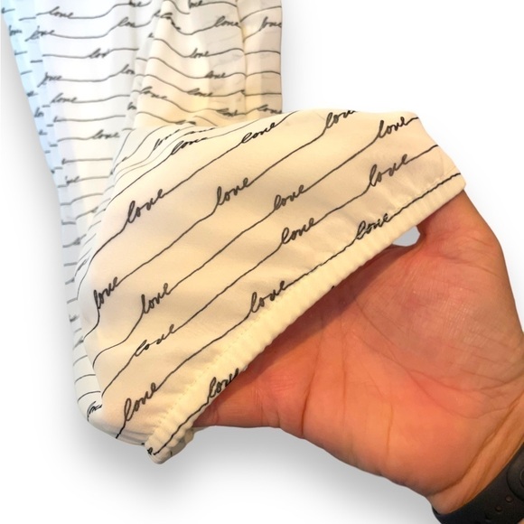 EXPRESS | High Neck Black + Ivory “LOVE” Cursive Print Tank Blouse - Picture 3 of 7